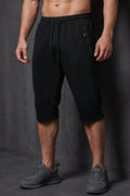 Men’s black casual shorts with elastic waistband, drawstring and zipper pockets